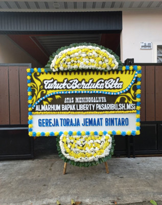 Papan Bunga Duka di Mondoretno